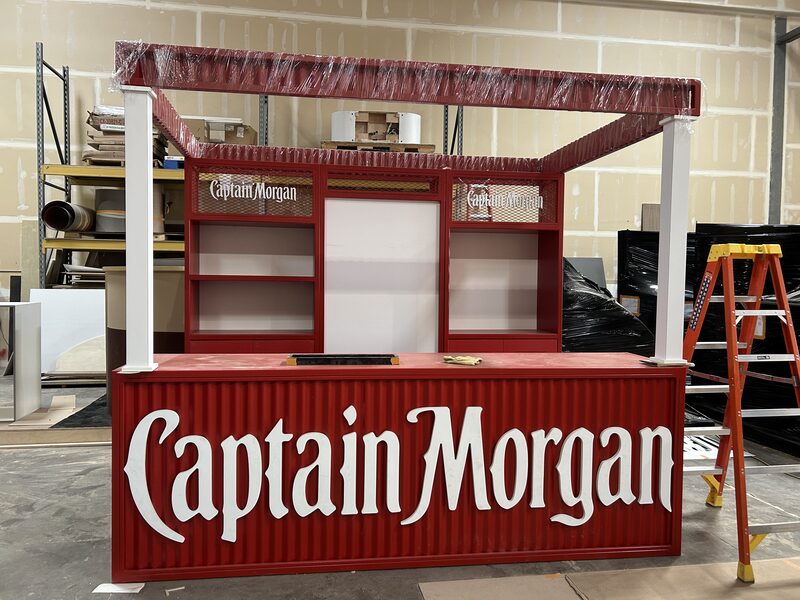 Red Captain Morgan event bar assembled in a workshop before installation
