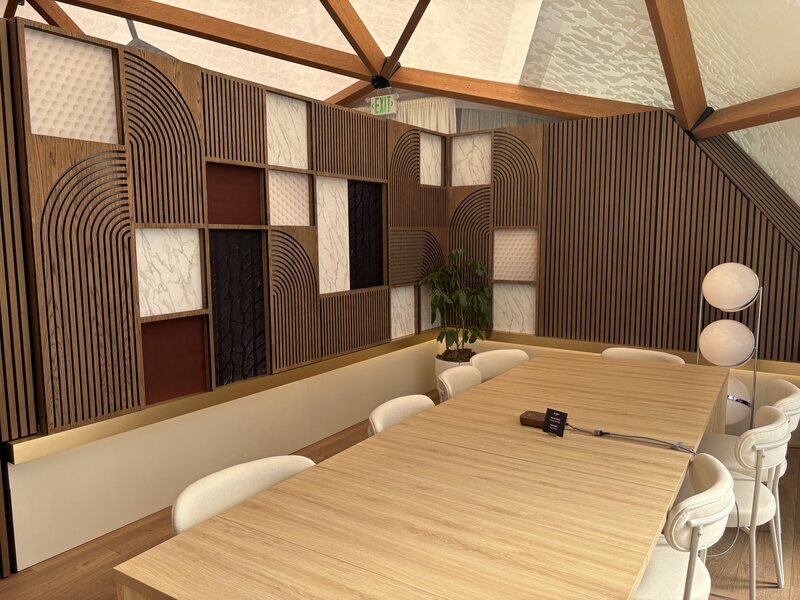 Meeting room with sculpted wood slat walls and illuminated display panels