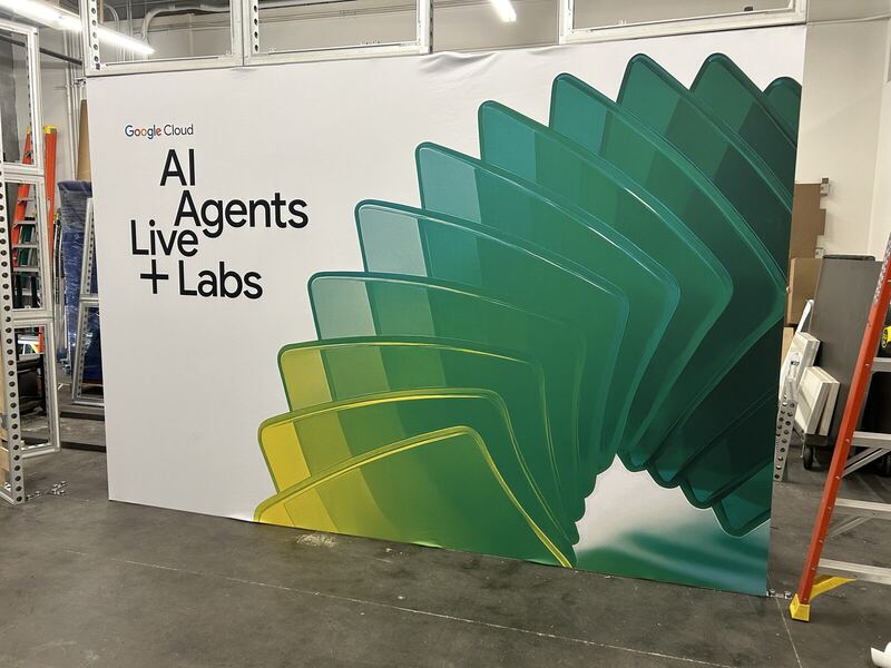 Frame and graphics test build on the staging floor — printed by Red Bliss, Las Vegas