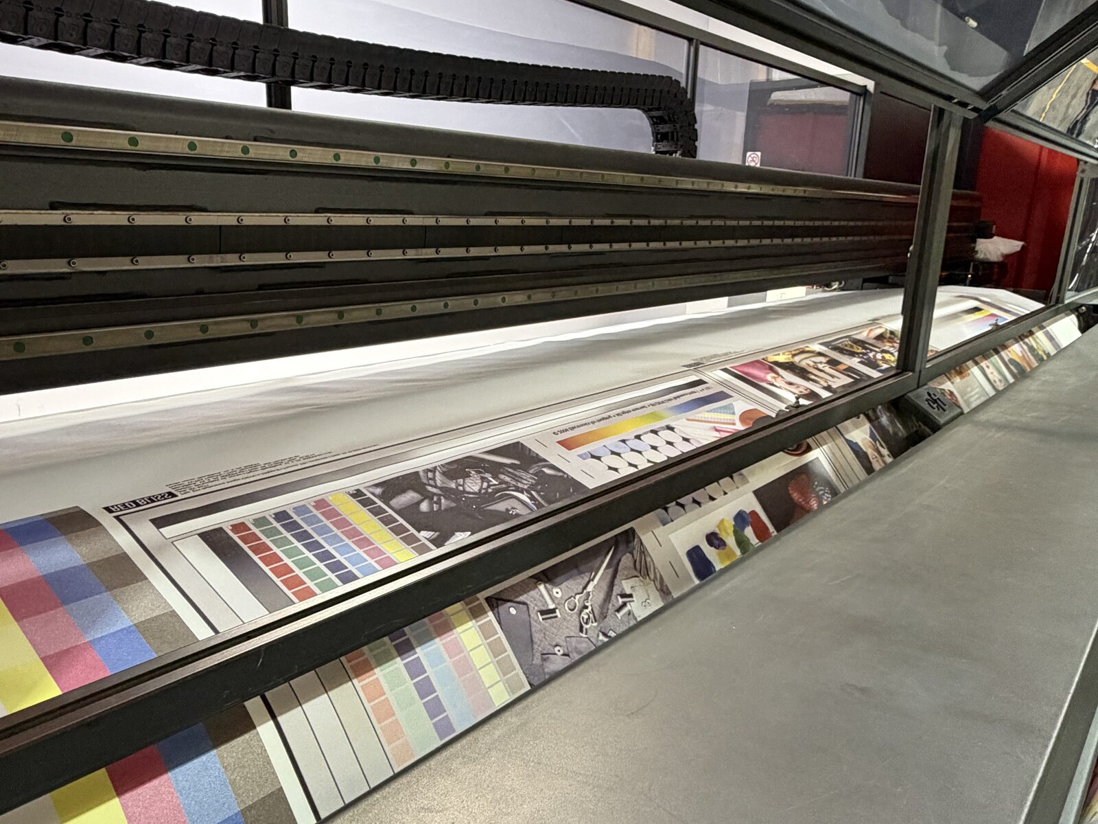 EFI VUTEk FabriVU 340 running fabric graphics on the production floor — Red Bliss, Las Vegas