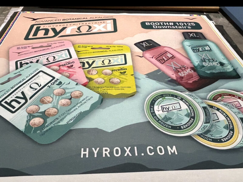 HYROX-branded product graphics printed on a large sheet laid out for inspection