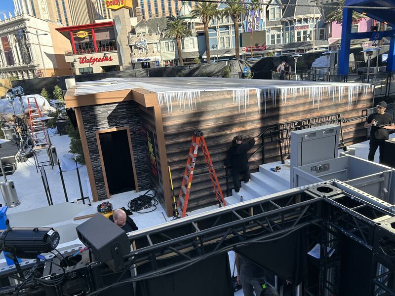 Red Bliss install crew setting graphics on the Las Vegas Strip