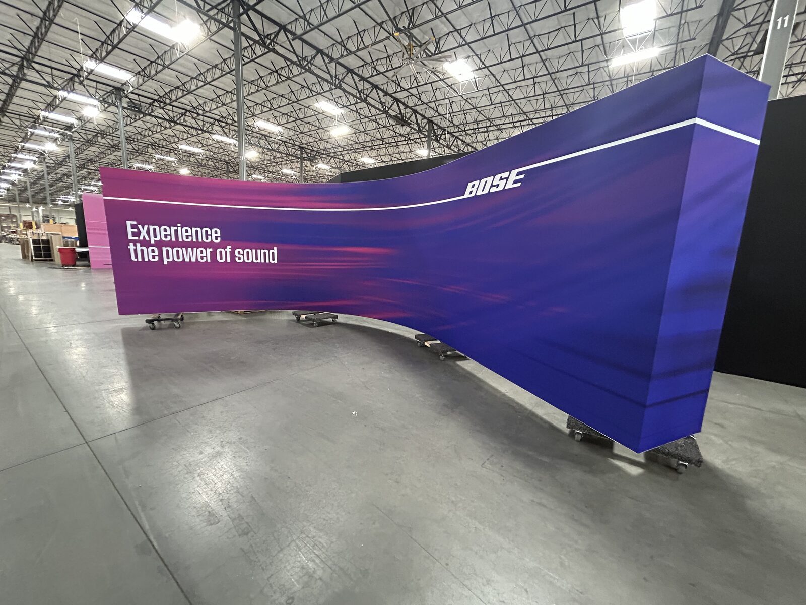 SEG fabric backwall graphics on the show floor — printed by Red Bliss, Las Vegas