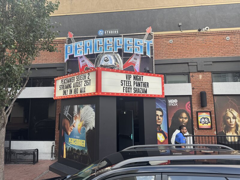 Peacemaker theater marquee with changeable letter panels and printed graphics