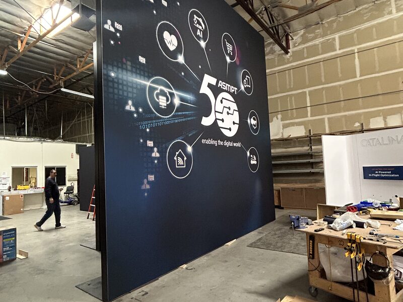 SKB Cases graphic wall being assembled in a production space