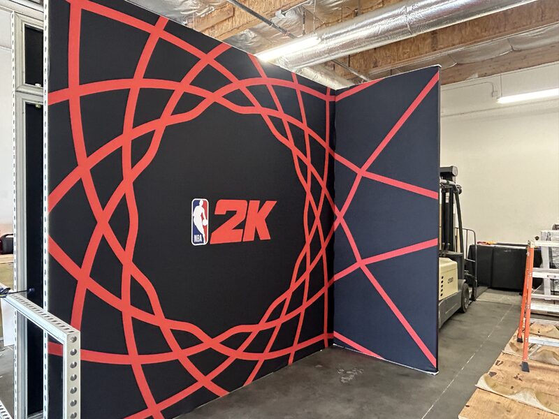 Colorful basketball-themed exhibit graphic mounted on a freestanding wall