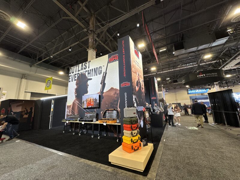 Modular SKB exhibit wall with product graphics and display shelves